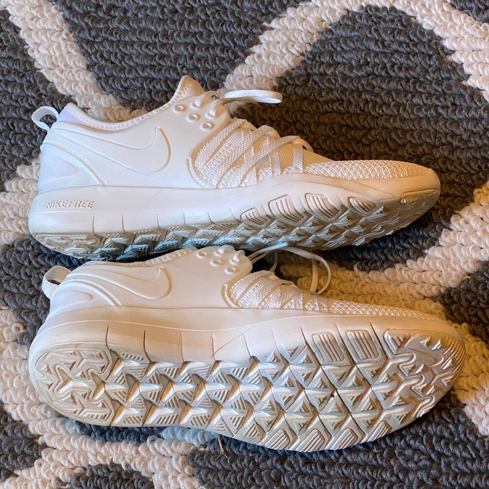 All white nike training shoes